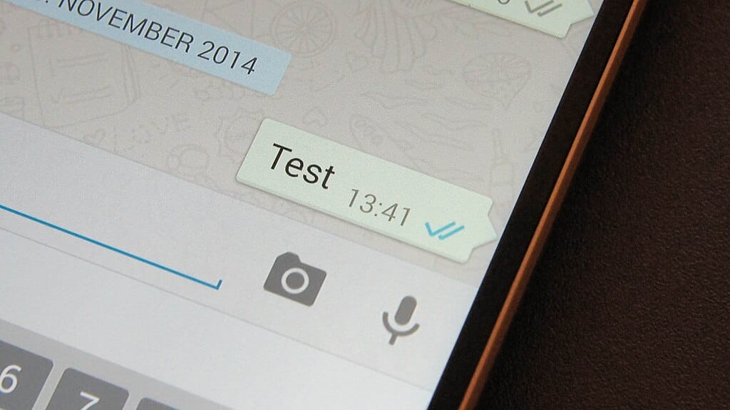 WhatsApp 2025 features illustration of WhatsApp message with blue read receipts