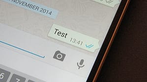 WhatsApp 2025 features illustration of WhatsApp message with blue read receipts